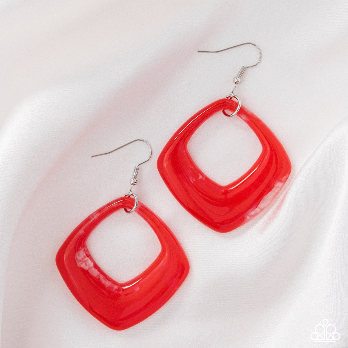 Close Coloring red dangle earrings styled view