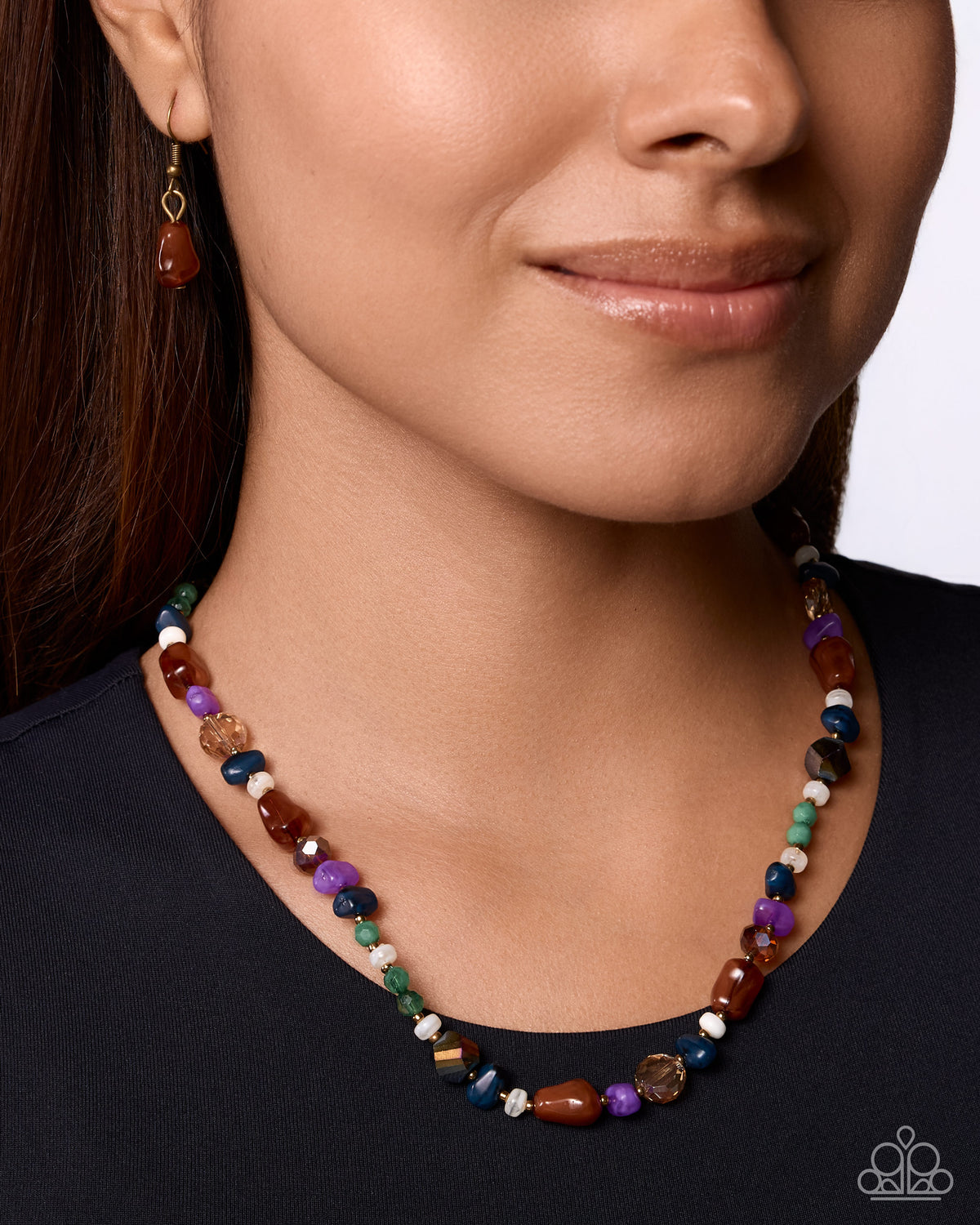 Close-up of multicolored stones and brass beads in Shameless Stones necklace