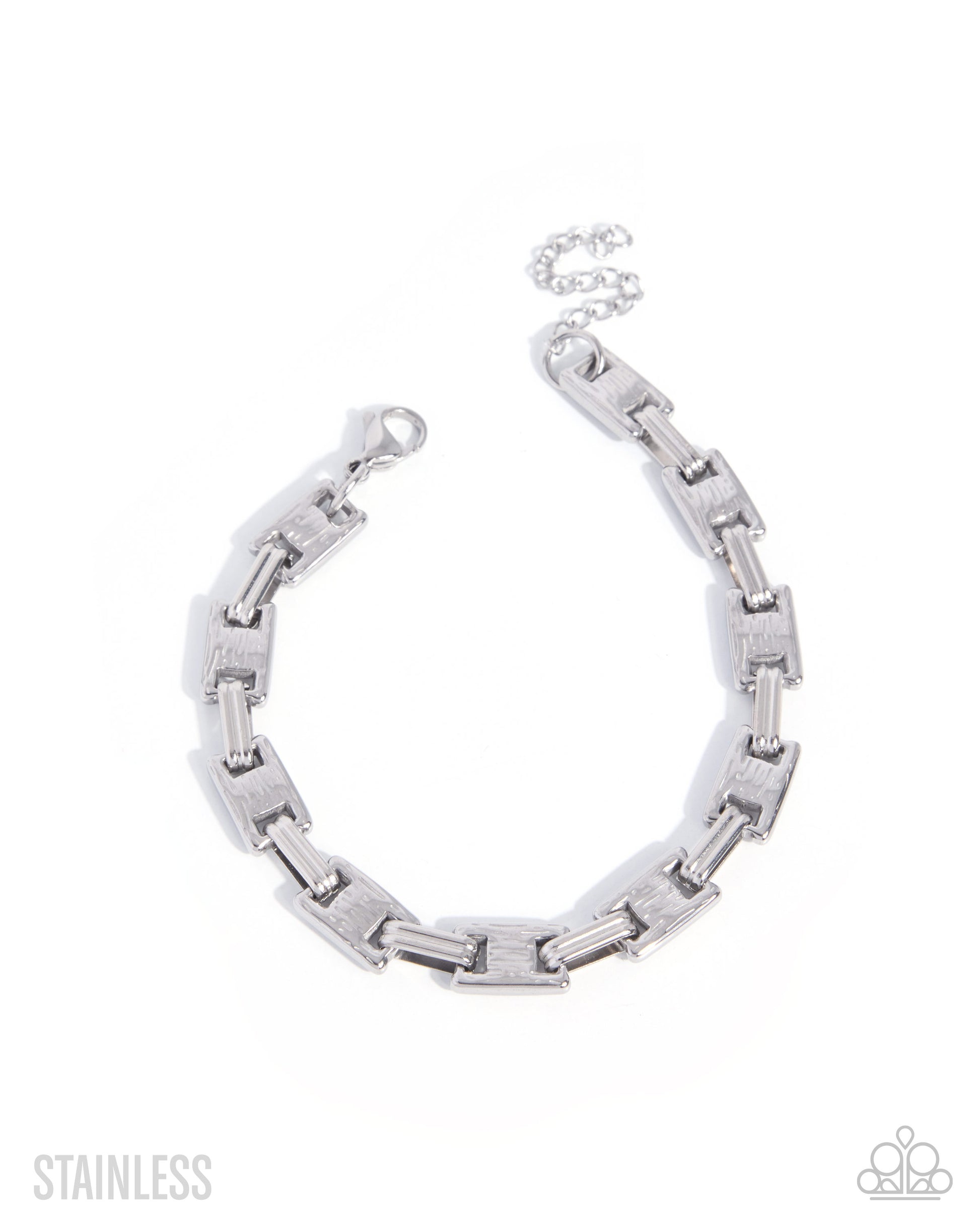 A silver stainless steel link chain bracelet with a textured, brushed finish on the larger rectangular links and a polished clasp, displayed on a clean white background with 'STAINLESS' text in the bottom left and a small logo in the bottom right.