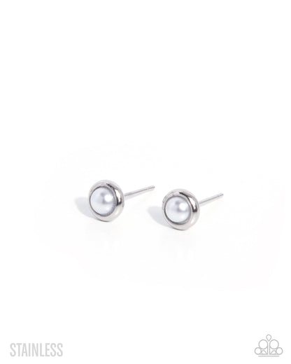 A pair of minimalist stainless steel stud earrings with round bezel-set white pearls, shown on a clean white background with a faint shadow.