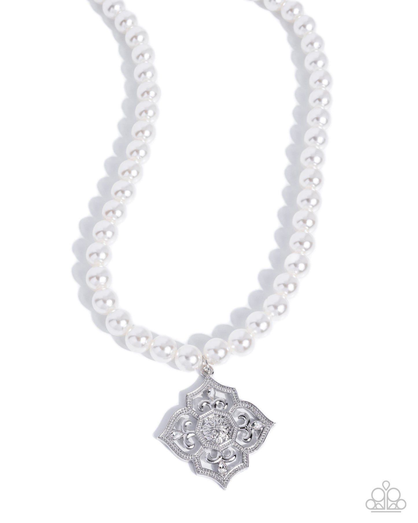 A white pearl necklace with a silver filigree pendant featuring a clear central stone, shown on a clean white background.