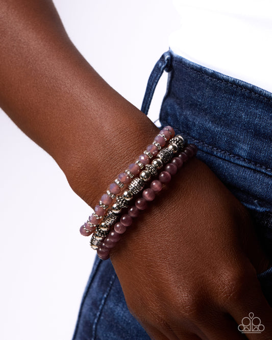 Endearing Expedition purple stretch bracelets shown on wrist