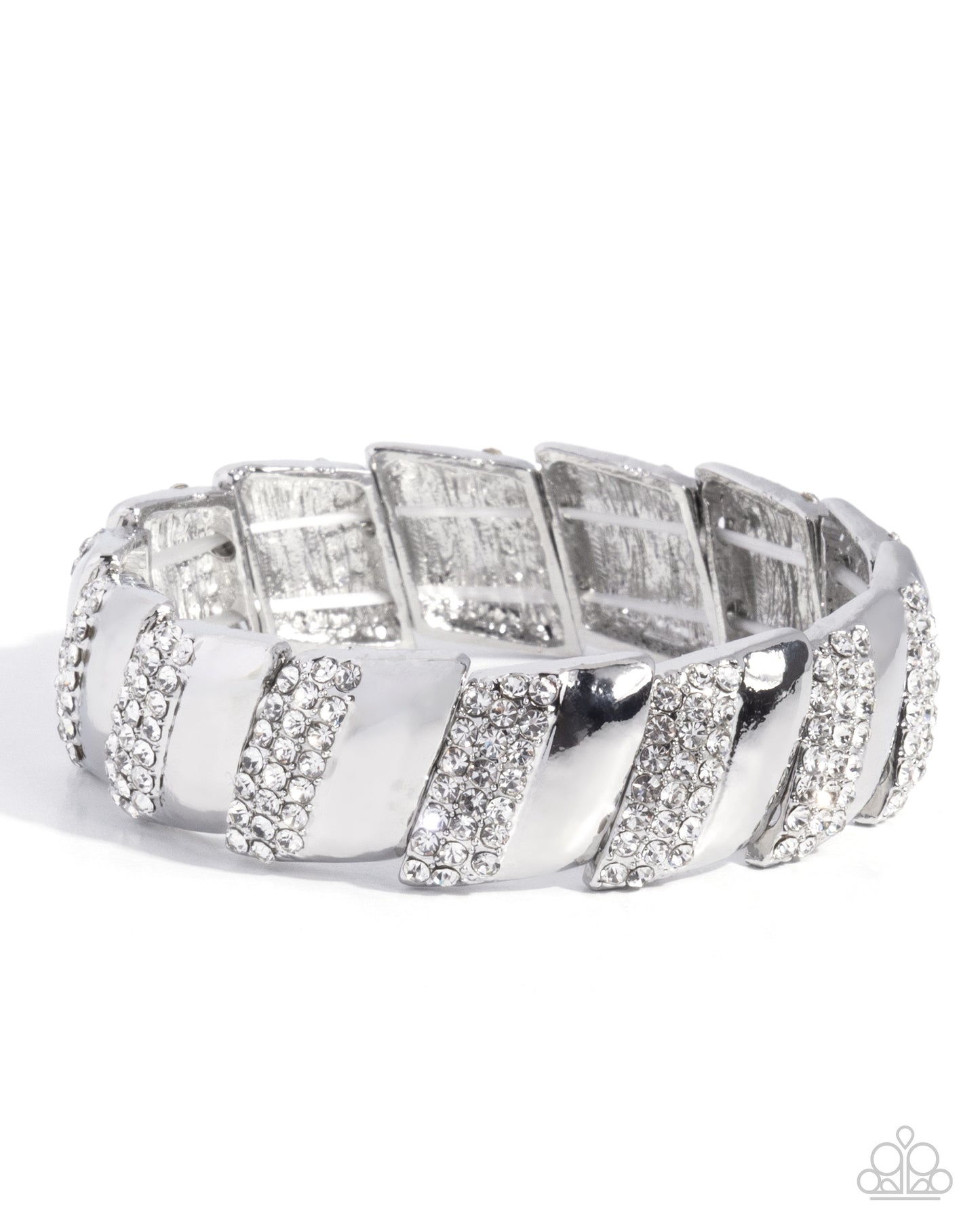 A wide silver-toned band ring featuring alternating raised rectangular panels and diagonal striped sections, all embellished with clear rhinestones, photographed on a white background.