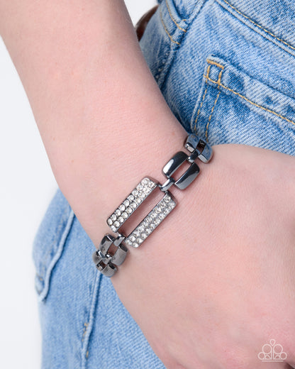Elaborately Enough gunmetal bar bracelet with white rhinestone detail