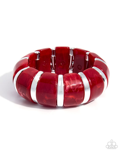 A chunky stretch bracelet made of glossy red translucent beads separated by polished silver metal bands, shown on a clean white background.