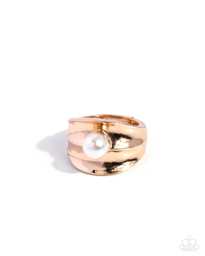 A rose gold wrap ring featuring a central white faux pearl, photographed on a clean white background with a soft shadow.