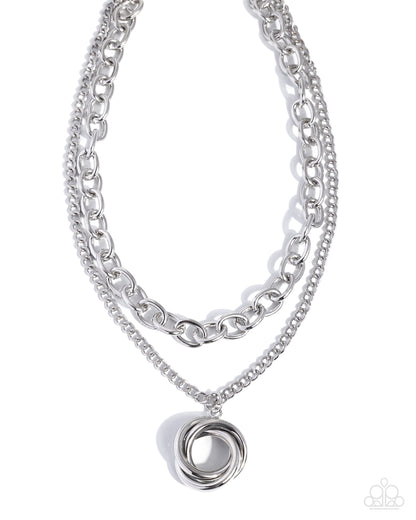 Coiled Credit silver layered necklace with a spiral pendant and cable chain from Jewelry by Bretta