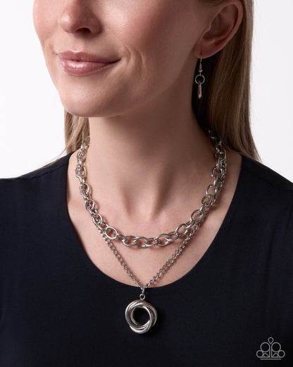 Coiled Credit silver layered necklace with a spiral pendant and cable chain from Jewelry by Bretta