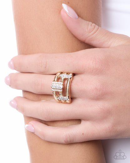 Melodic Merge gold textured band ring with white rhinestones detail