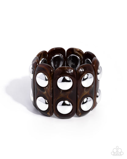 Elongated Era brown acrylic stretch bracelet with silver studs