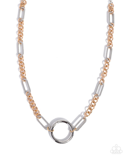 Confident Confrontation gold and silver mixed metal necklace