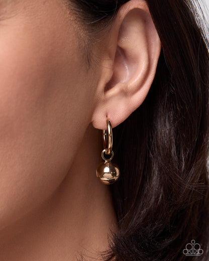 Round Reveal gold earring charm detail