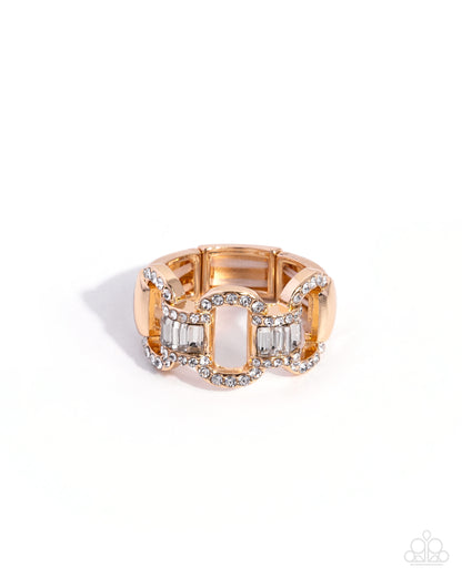 Interlocked Ideology gold chain-link stretch ring with white rhinestones and emerald-cut gems - Paparazzi Accessories at Jewelry by Bretta