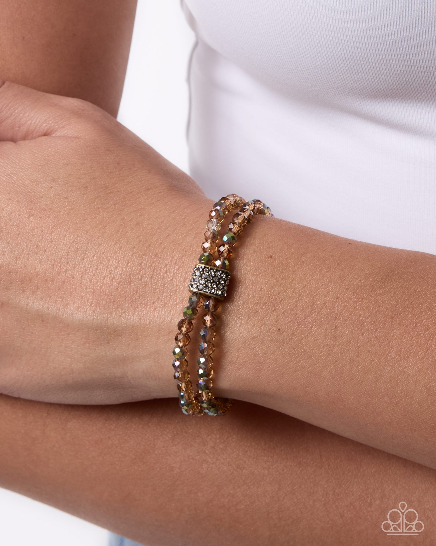 Engaged Elegance brass stretch bracelet with peach shimmer beads and white rhinestone accents by Jewelry by Bretta