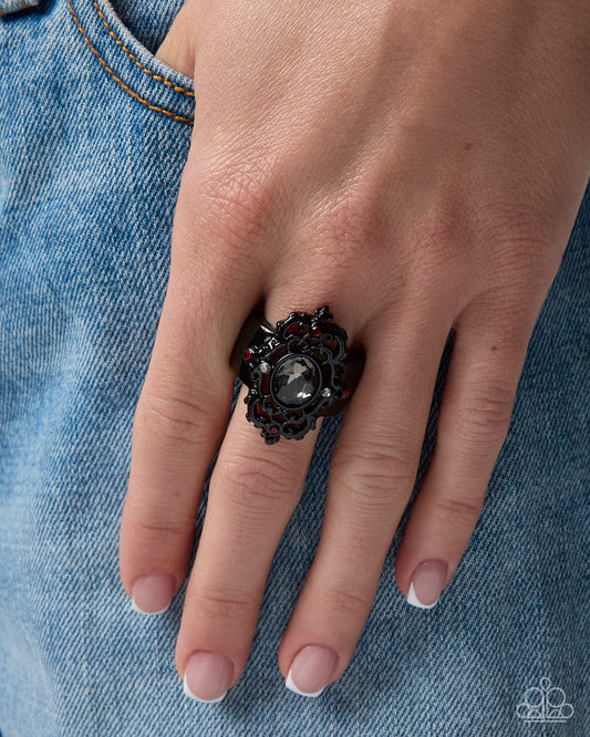 Close-up of Regency Report red statement stretch ring