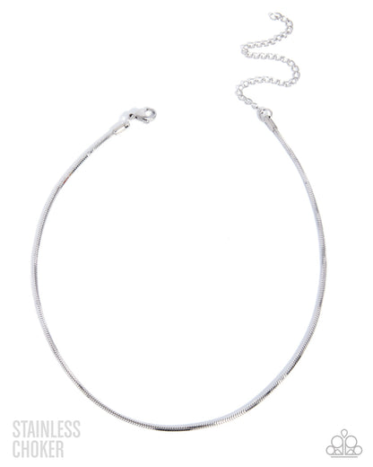 Silver choker necklace on a white background