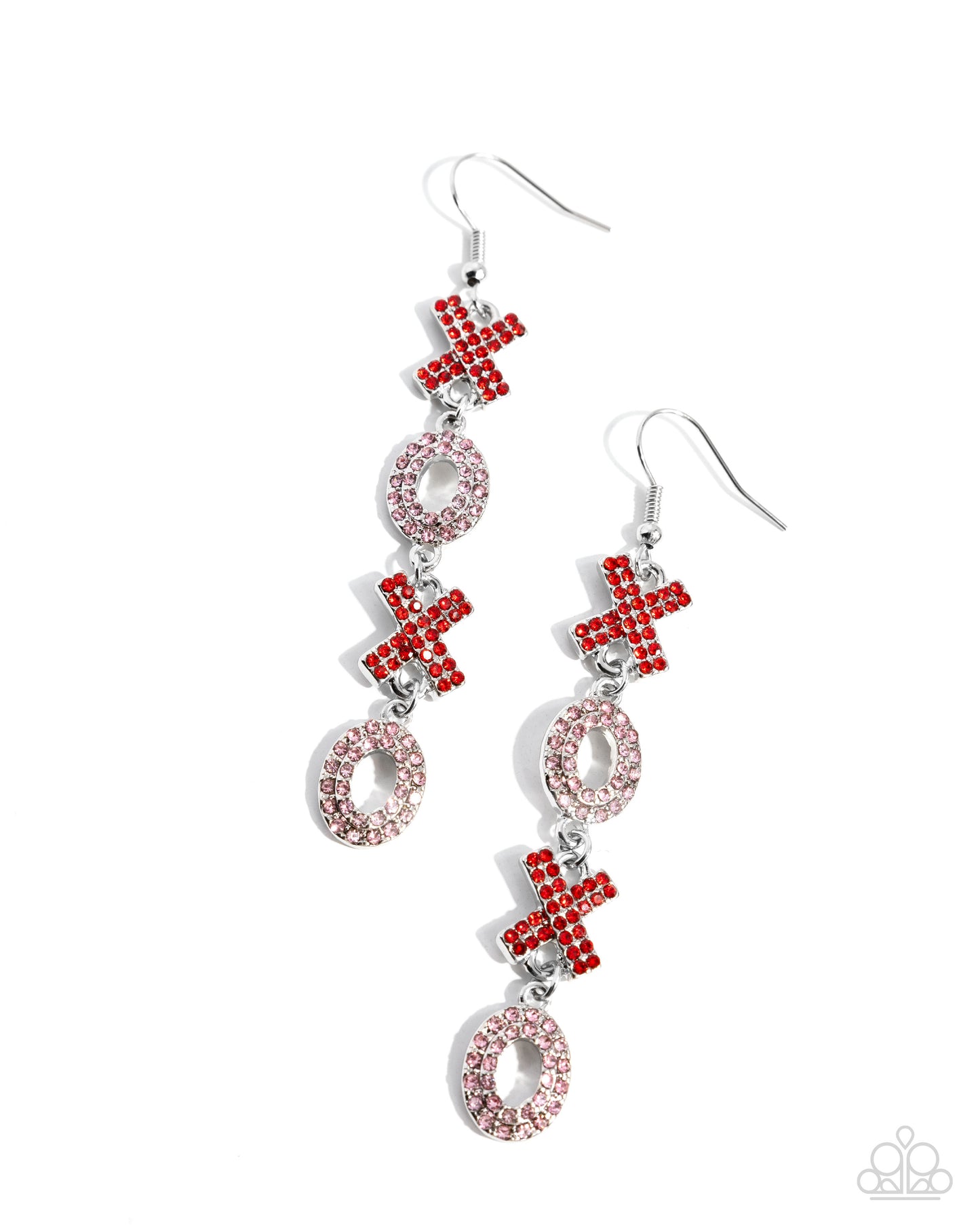 Pair of earrings with red and silver designs on a white background