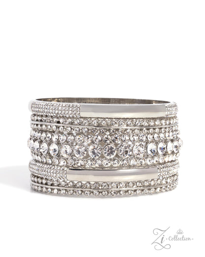 A wide silver-toned bangle bracelet embellished with multiple rows of clear rhinestones and round clear crystals, shown on a white background with a small 'Zi Collection' watermark in the lower right corner.