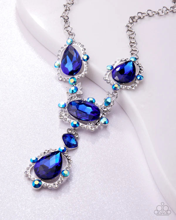 Necklace with blue teardrop-shaped stones on a white background