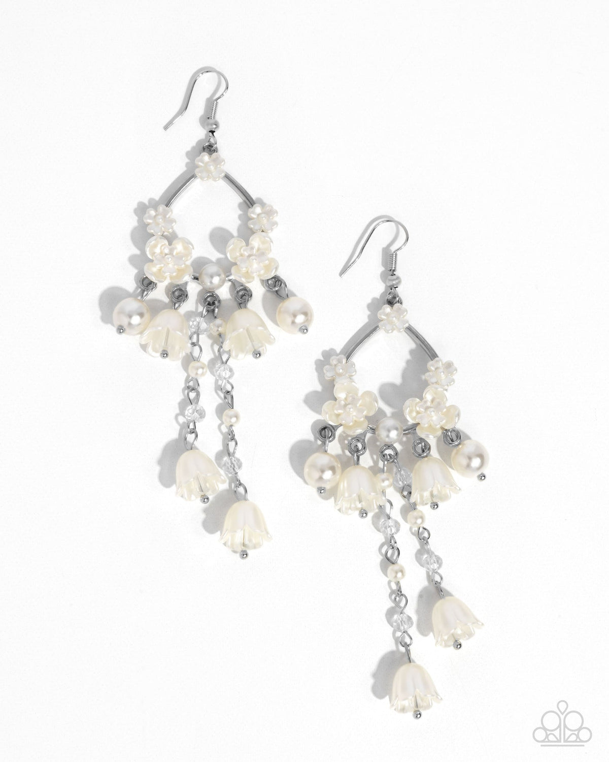 Harmonious Heir white pearl floral statement earrings worn on model
