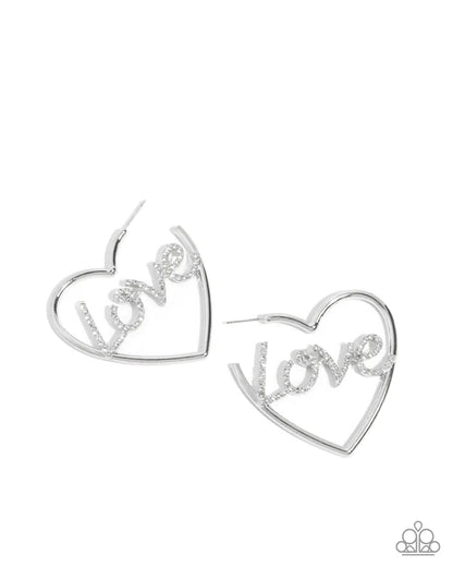 Heart-shaped earrings with 'LOVE' inscription on a white background
