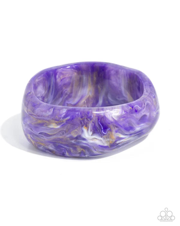 Purple and gold marbled bangle on a white background