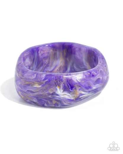 Purple and gold marbled bangle on a white background