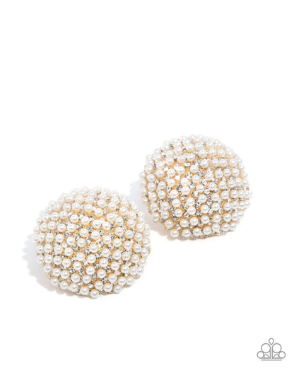 Pair of pearl-like spherical earrings on a white background