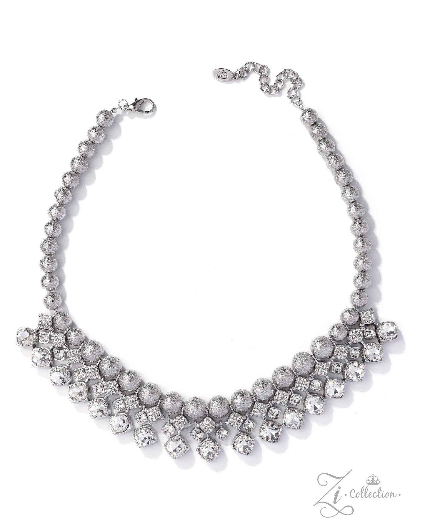 Silver necklace with pearls and crystals on a white background