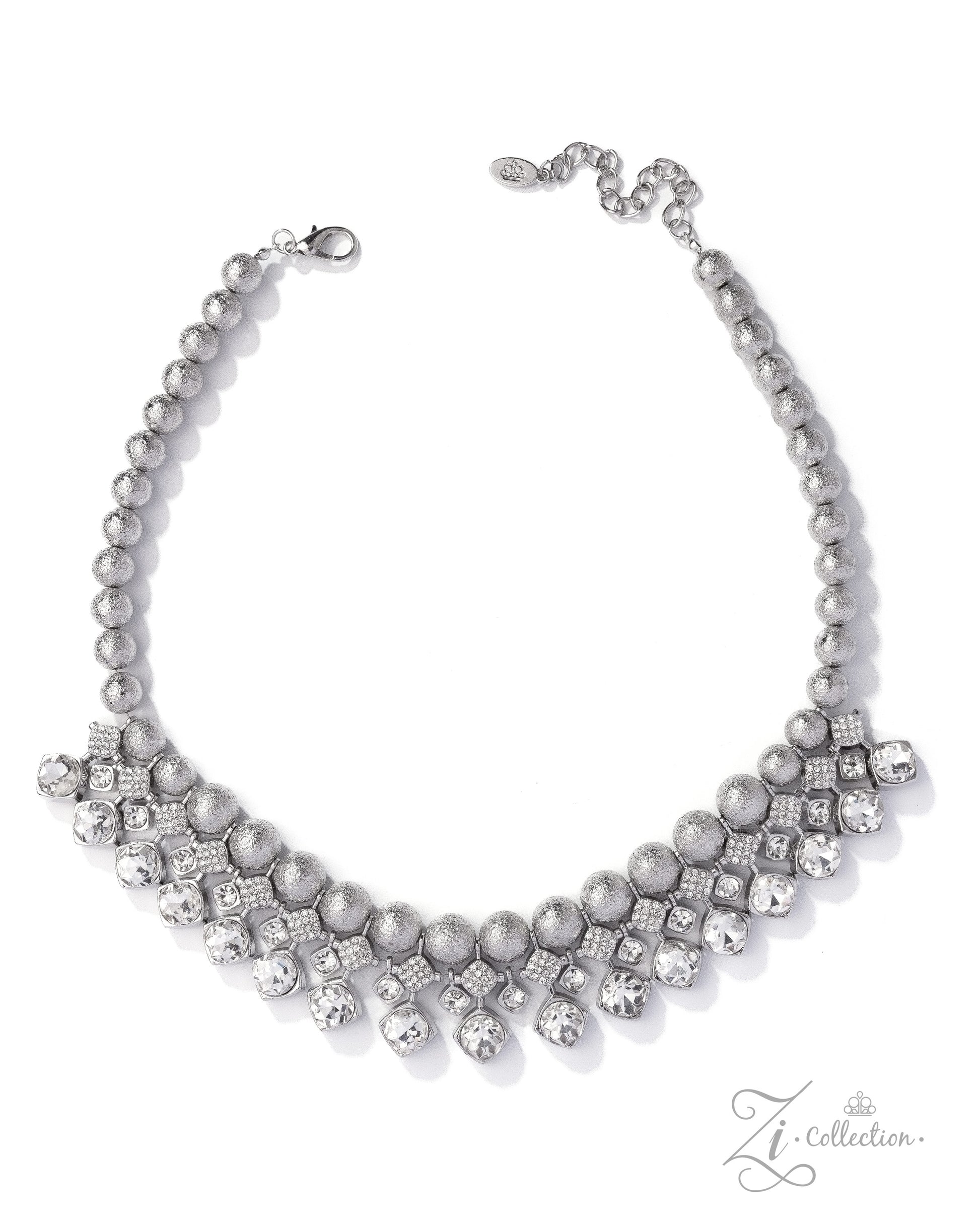 Silver necklace with pearls and crystals on a white background