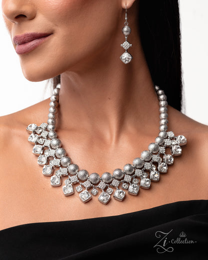 Woman wearing a luxurious diamond necklace and earrings with a blurred background