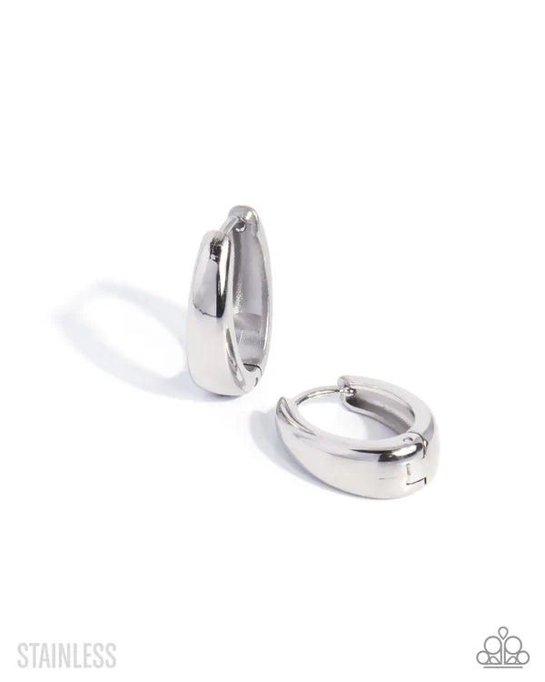 Pair of silver hoop earrings on a white background