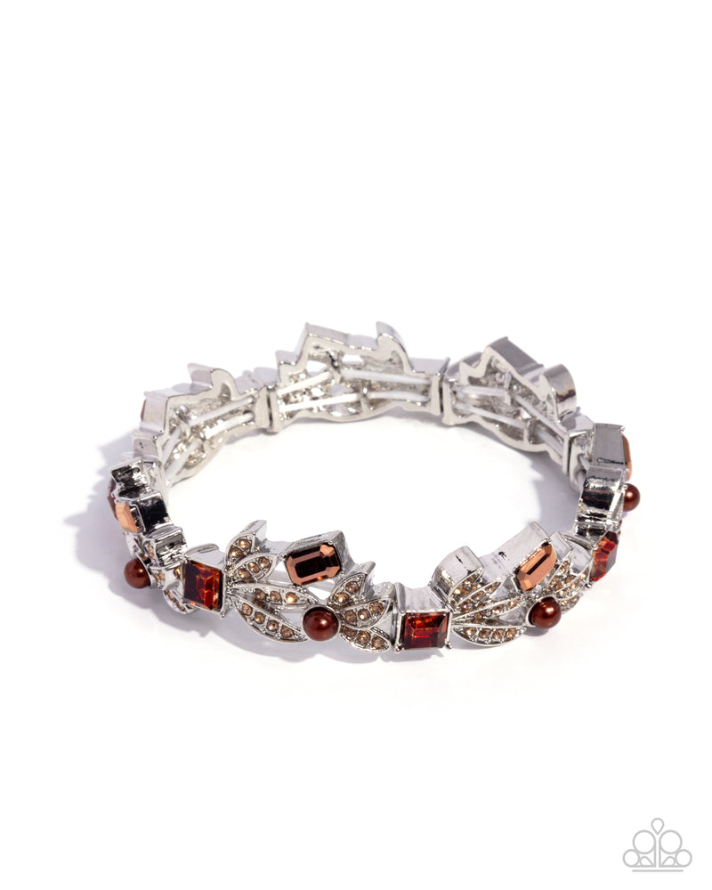 Mind-Blowing Moment Brown Paparazzi stretchy bracelet with brown pearls, topaz rhinestone leaves, and brown gems