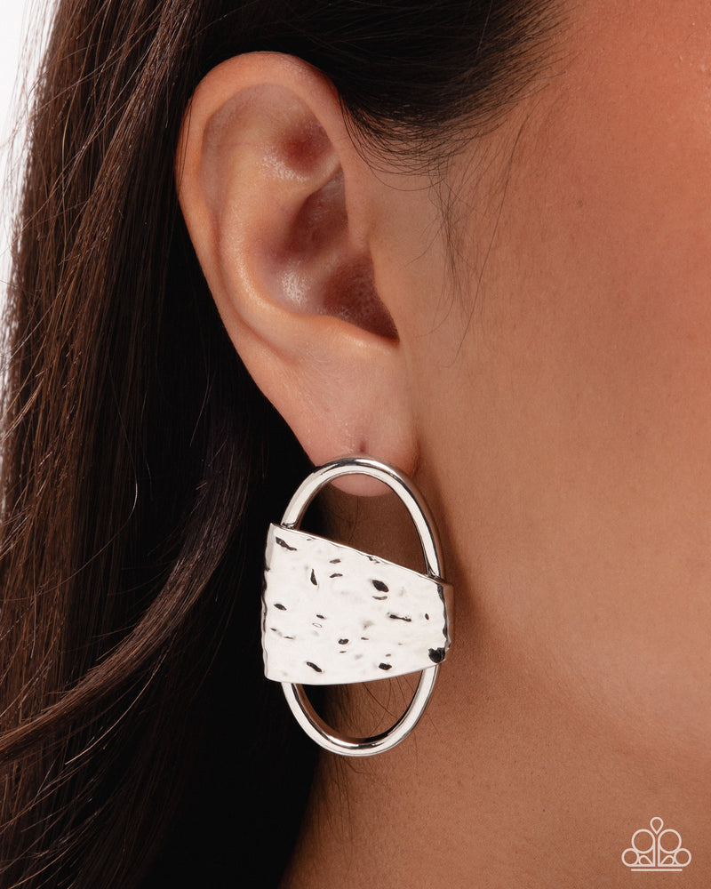 Close view of Oval Attitude Silver hammered oval post earrings
