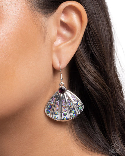 Sophisticated Seashell Purple Paparazzi silver rhinestone earrings worn by a model
