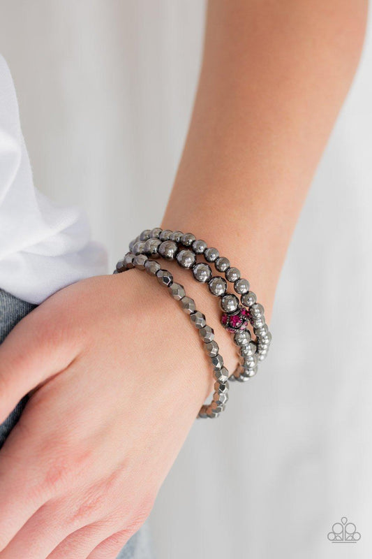 Paparazzi Accessories-Noticeably Noir - Pink Bracelet