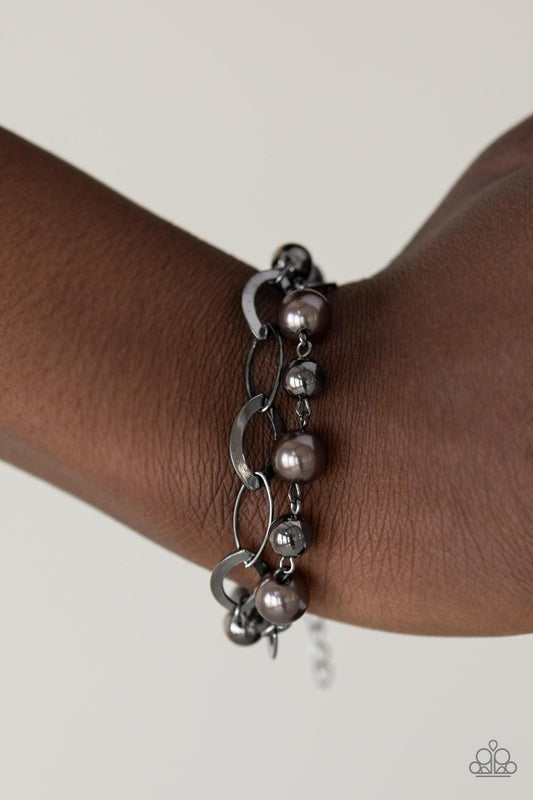 Paparazzi Accessories-Winner Glimmer - Black Bracelet - jewelrybybretta