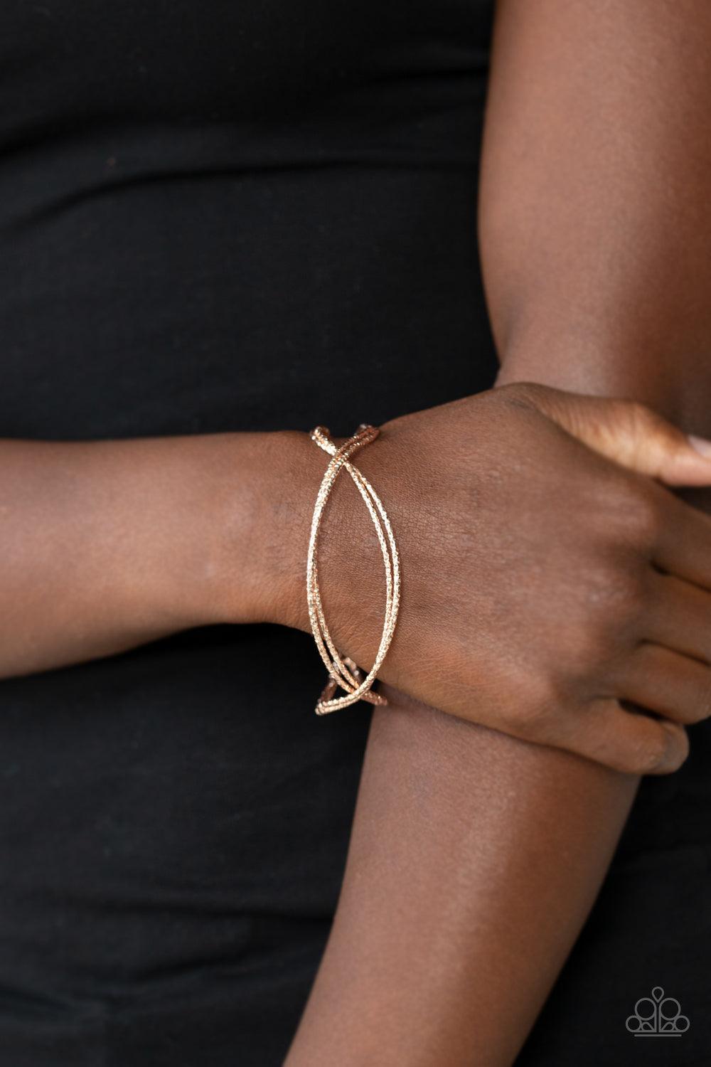 Paparazzi Accessories-Bending Over Backwards - Rose Gold Bracelet