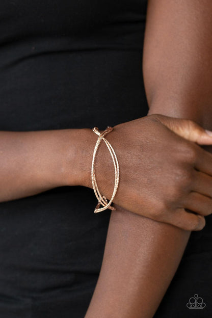 Paparazzi Accessories-Bending Over Backwards - Rose Gold Bracelet