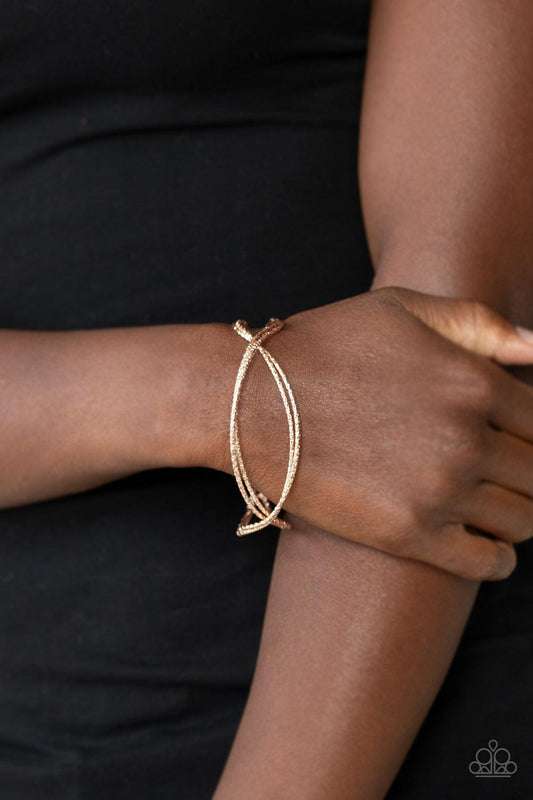 Paparazzi Accessories-Bending Over Backwards - Rose Gold Bracelet